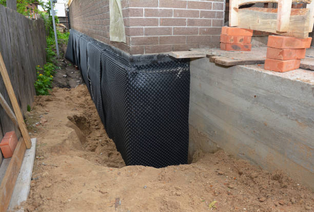 Happy homeowners after waterproofing job in Star Tannery